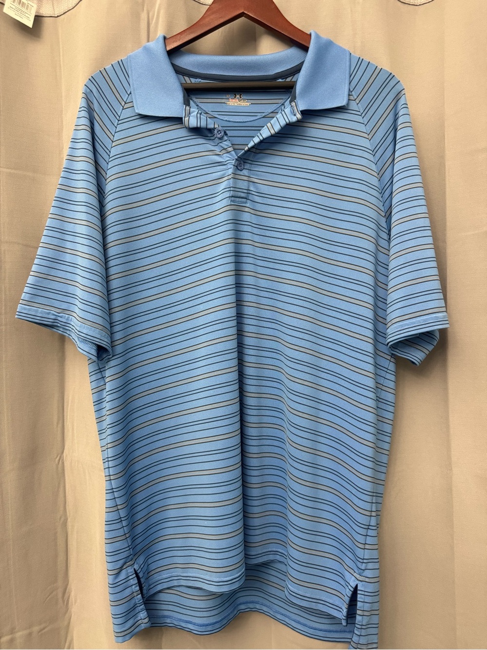 Under Armour Men’s Heat gear polo - size Large